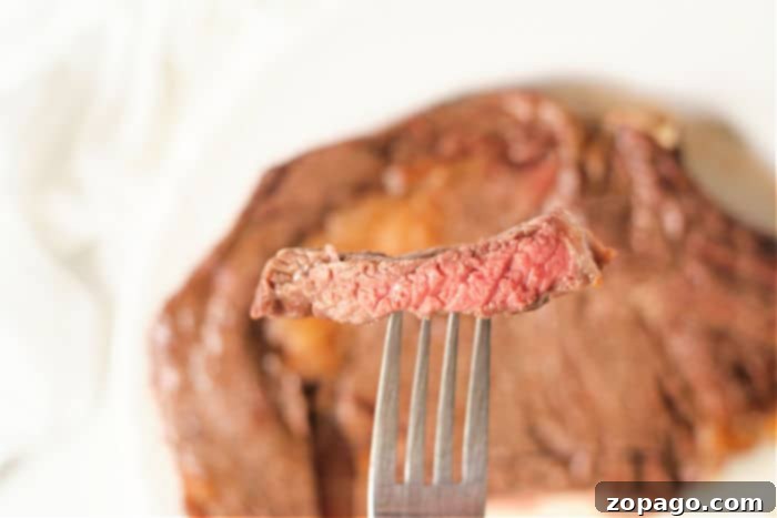 Perfect Air Fryer Ribeye 9 Air fryer ribeye steak, sliced and ready to be enjoyed.