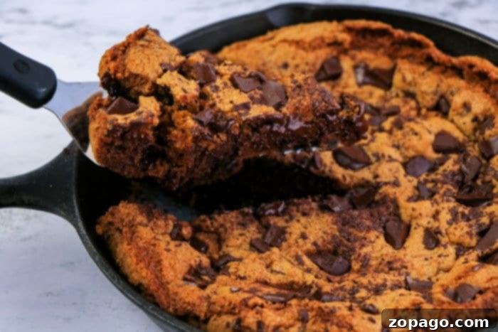 Gooey Cast Iron Skillet Chocolate Chip Cookie 6 A beautifully golden-brown Cast Iron Skillet Chocolate Chip Cookie, perfectly baked.