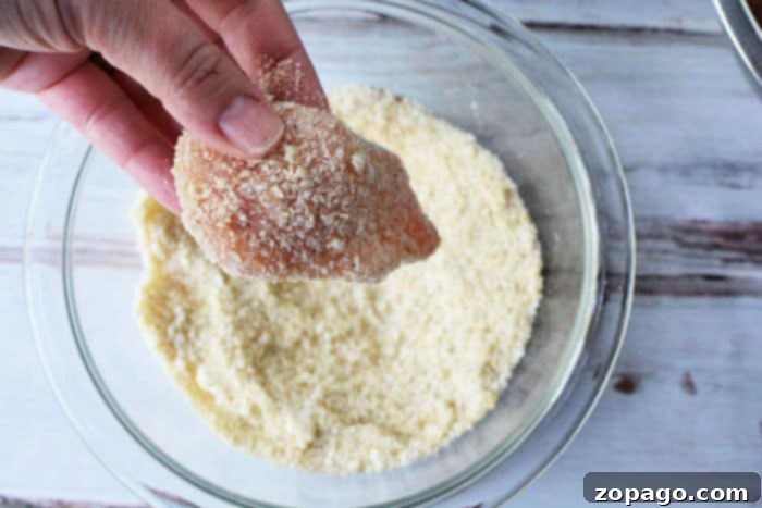 Crispy Air-Fried Chicken Bites 5 A bowl of seasoned boneless wings ready for the air fryer