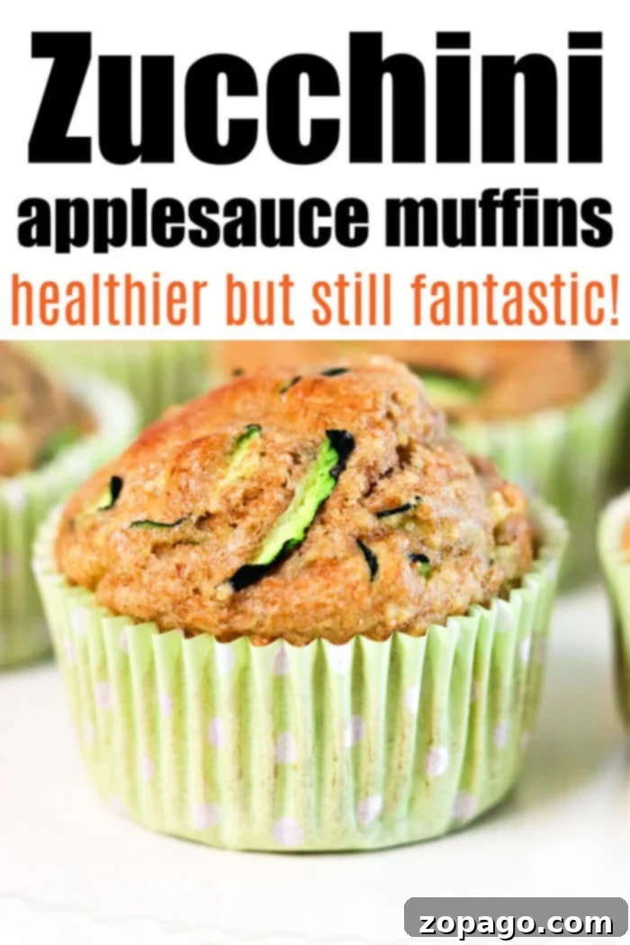 Wholesome Zucchini Applesauce Muffins 6 A stack of three healthy zucchini muffins, showing their light texture and inviting appearance, ready for a nutritious snack.