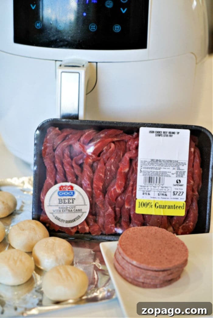 Air Fryer Beef Wellington Puffs 4 Easy Beef Wellington components laid out, showcasing the thinly sliced beef and pate.