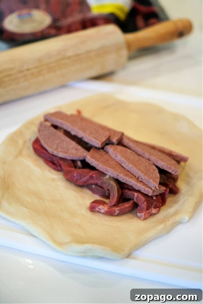 Crispy Air Fryer Beef Wellington Pockets 6 Assembled beef Wellington hot pocket, ready for the air fryer.