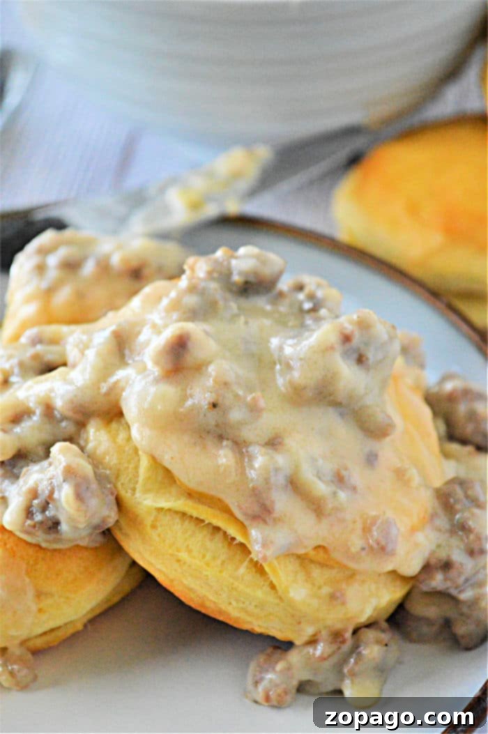 Effortless Instant Pot Sausage Gravy 2 Rich, creamy Instant Pot Sausage Gravy poured over fluffy biscuits, ready for a hearty breakfast or brunch.
