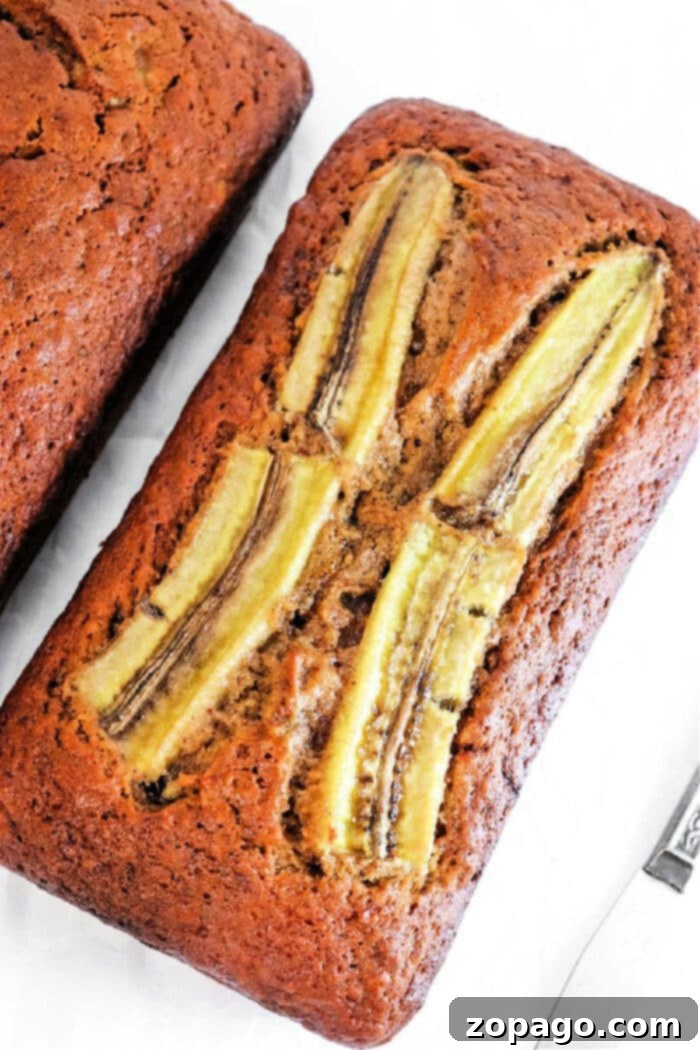 Zingy Ginger Banana Bread 7 Sliced Gingerbread Banana Bread on a white plate