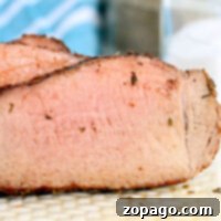 Succulent Air Fryer Rump Roast 8 A close-up of a cooked rump roast with a crispy exterior.