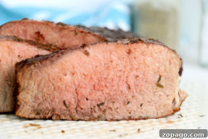 Succulent Air Fryer Rump Roast 9 A whole cooked rump roast, beautifully browned and ready for carving.