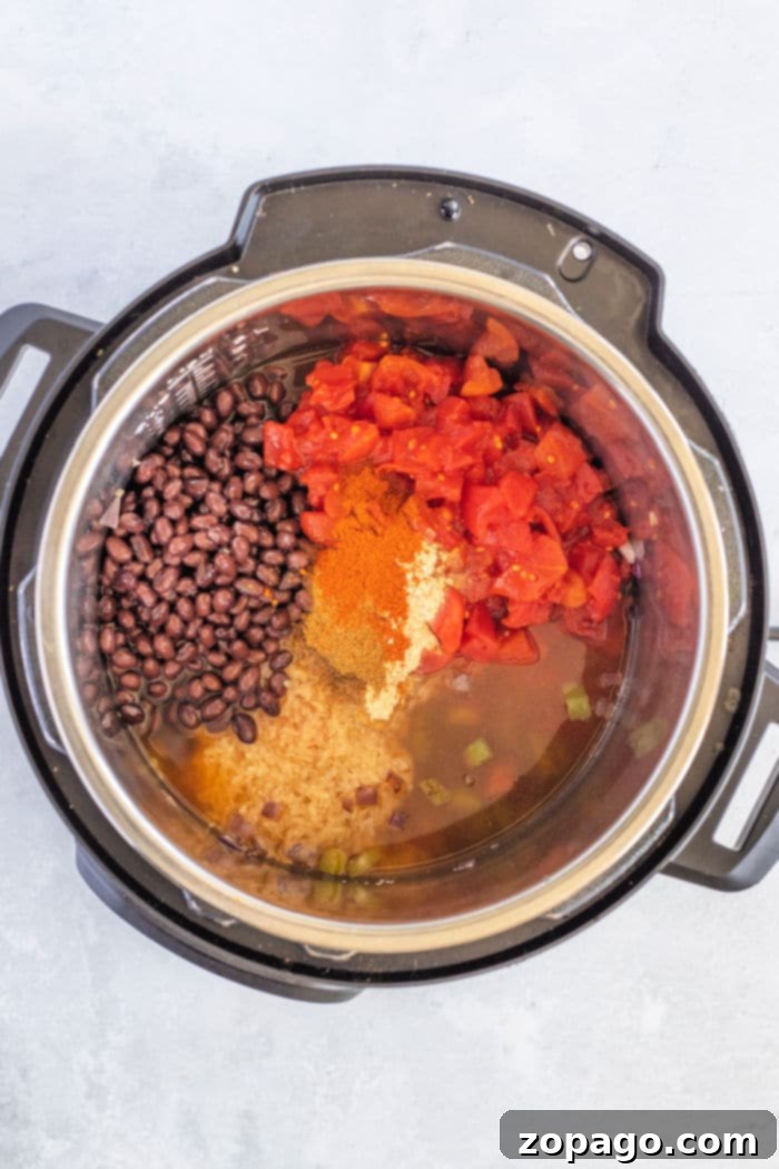 Easy Instant Pot Black Beans and Rice 6 Pressure cooker Black Beans and Rice in a serving bowl.