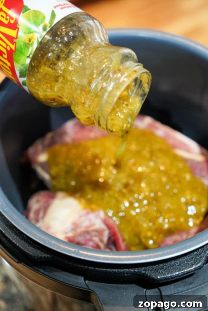 No Thaw Fall-Apart Instant Pot Chuck Roast 5 Tender chuck roast, shredded and swimming in its flavorful Instant Pot sauce.
