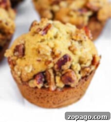 Spiced Sweet Potato Muffins 10 Golden-brown cinnamon sweet potato muffins, freshly baked and ready to enjoy.