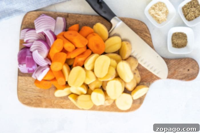 Speedy Instant Pot Chicken and Garden Vegetables 4 Hearty Instant Pot chicken and vegetables featuring potatoes, carrots, and tender chicken pieces.