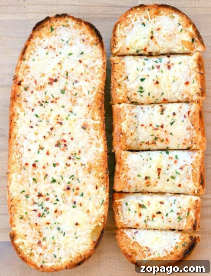 Irresistible Roasted Garlic Bread 7 Close-up of freshly baked Spicy Cheese Bread, golden and inviting