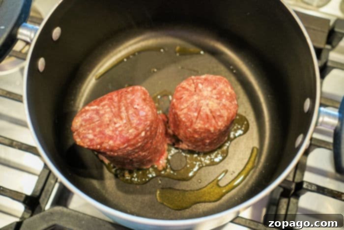 Browning hamburger meat in a skillet