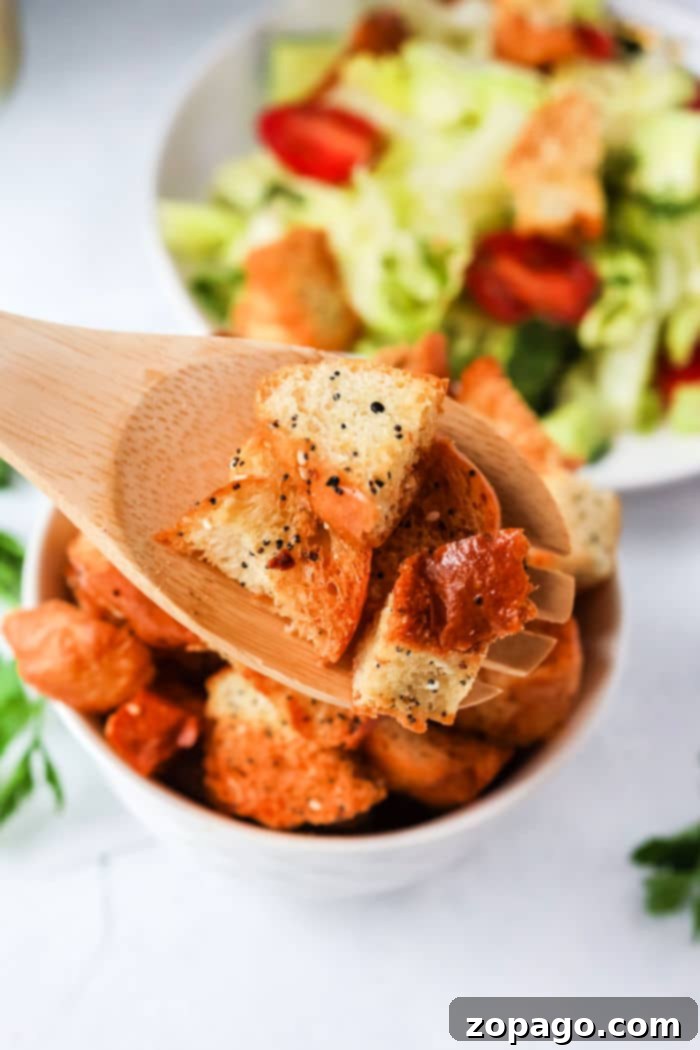 Ultimate Air Fryer Croutons 7 A close-up view of air fryer croutons, highlighting their uniform size and golden color, ready for storage or immediate use.