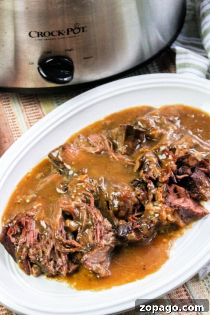 Fall-Apart Tender Slow Cooker Roast Beef and Savory Gravy 2 Slow Cooker Roast Beef and Gravy, rich and tender
