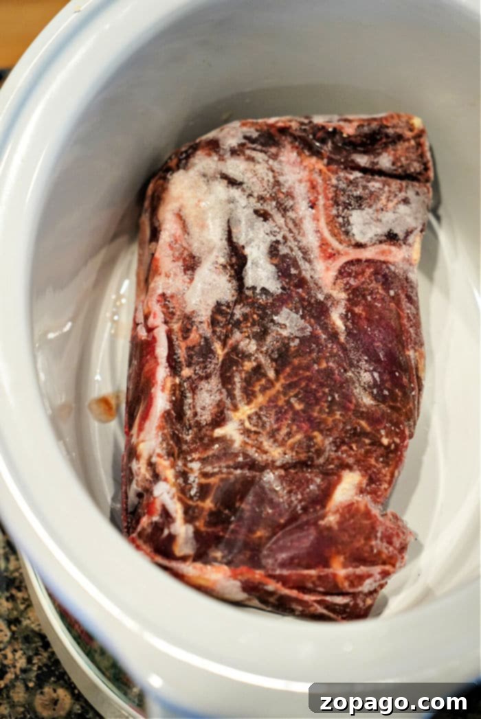Fall-Apart Tender Slow Cooker Roast Beef and Savory Gravy 9 crockpot frozen chuck roast before cooking