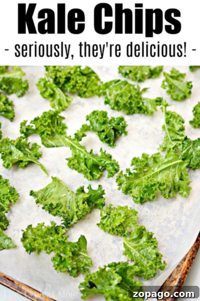 Easy kale chips recipe for those of you, like me, who weren't believers. They really are good and tasty, even my kids liked them! #kale #kalechips #ranchkalechips A baking sheet filled with perfectly golden brown and crunchy kale chips, fresh from the oven, ready to be served as a healthy snack.