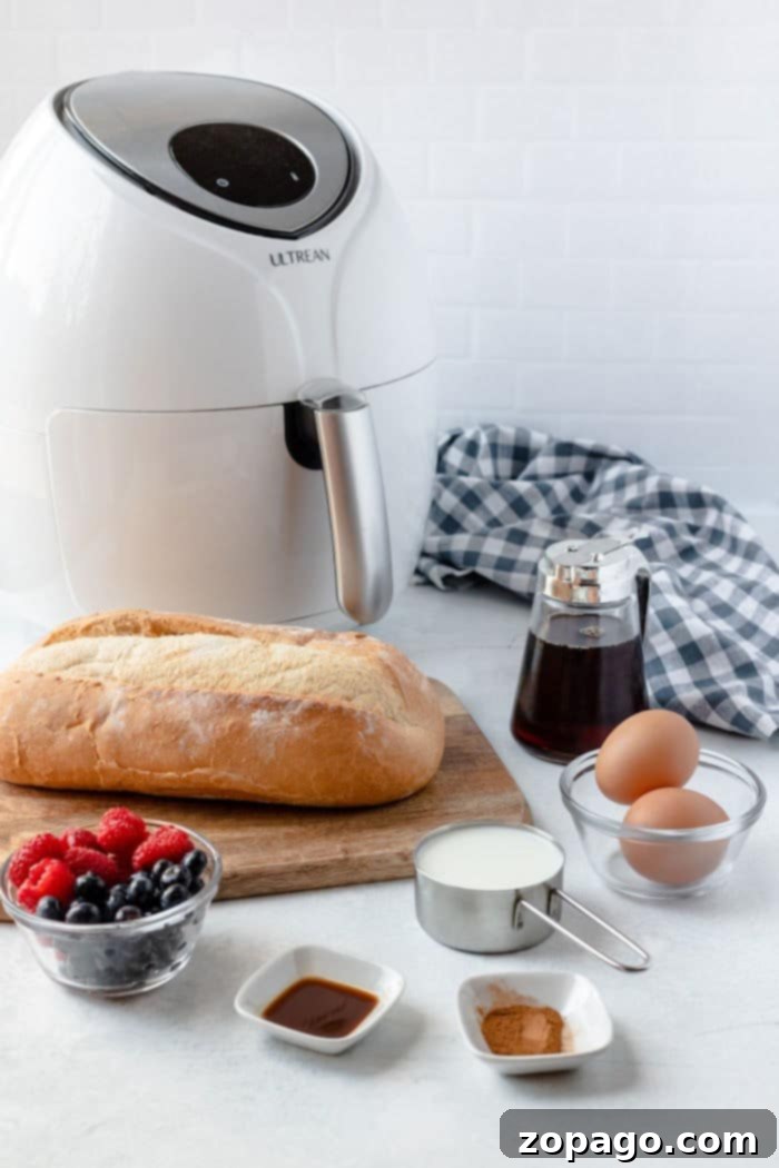 Easy Air Fryer French Toast 4 Thick-cut French toast slices arranged on a plate, ready for the air fryer