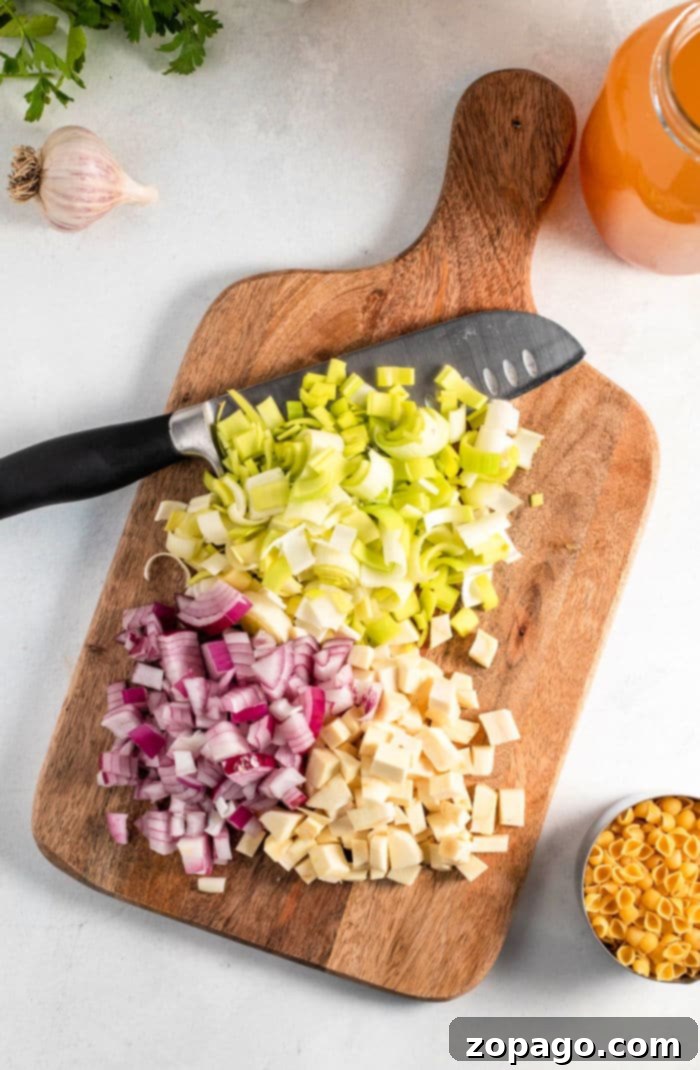 Slow Cooker Minestrone Soup 3 VEGETABLE SOUP IN SLOW COOKER, featuring a rich medley of garden-fresh ingredients.