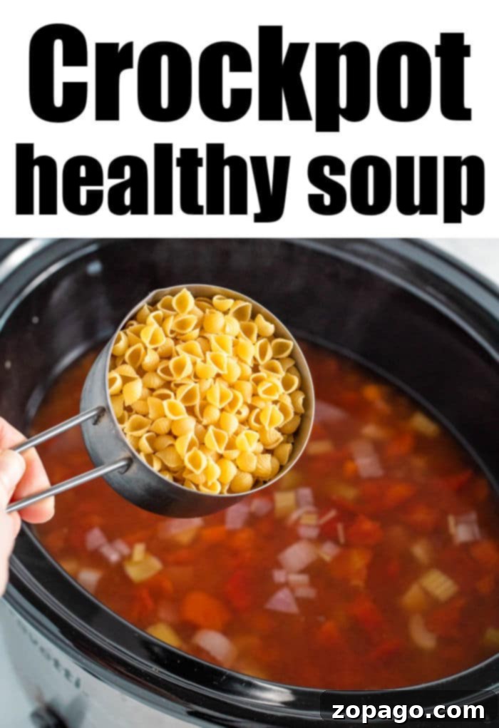 Hearty Crockpot Minestrone 6 A delicious and hearty healthy soup bubbling in a slow cooker, ready to serve.