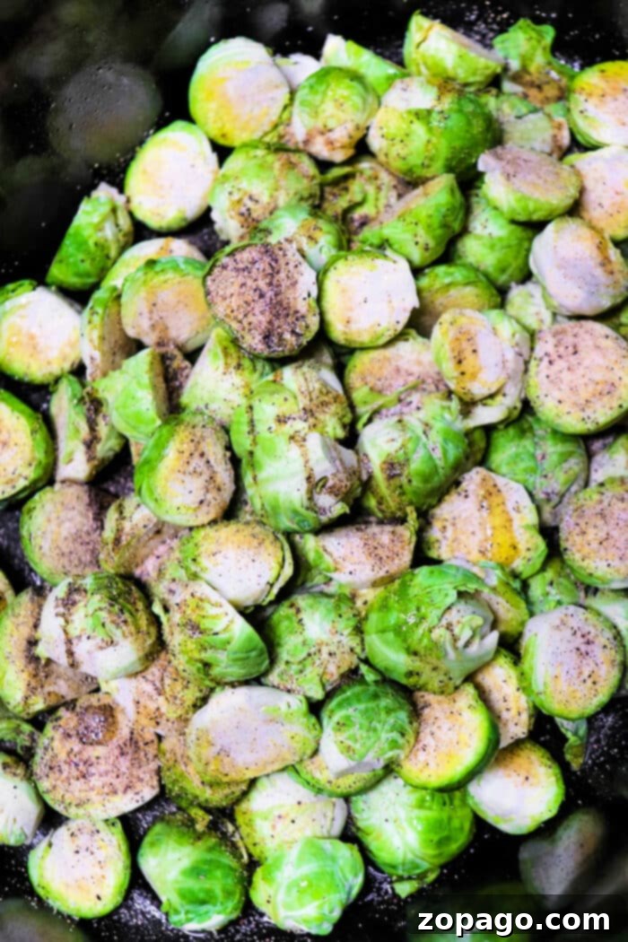 Easy Slow Cooker Brussels Sprouts 8 Crockpot Brussel Sprouts with Bacon served on a plate