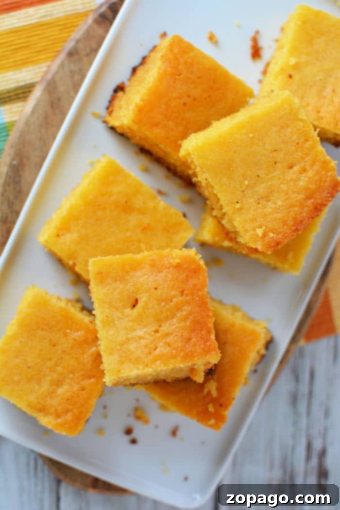Effortless Slow Cooker Cornbread 2 Golden brown fluffy Crockpot cornbread slices ready to serve