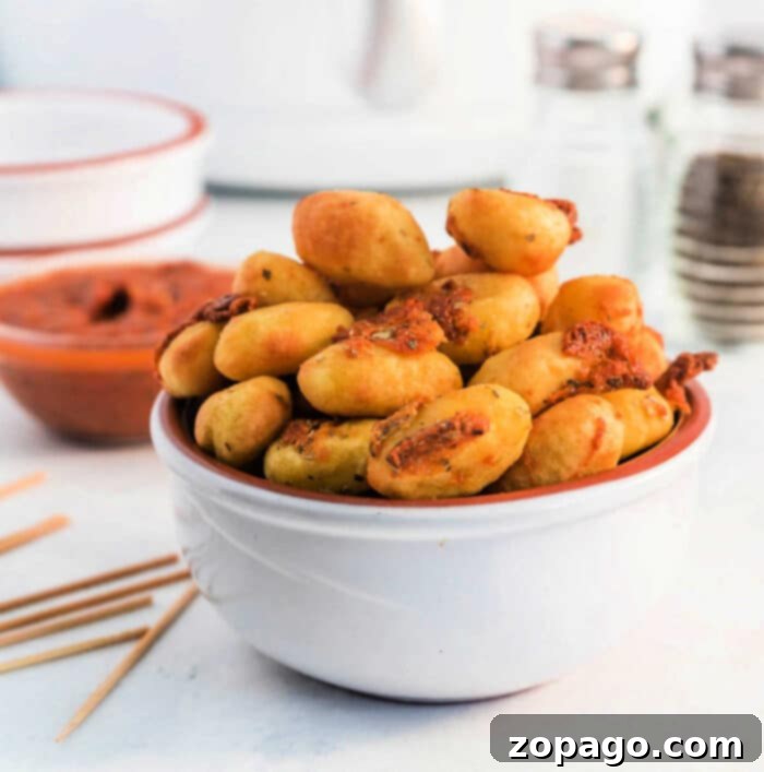 Crispy Ninja Foodi Air Fryer Gnocchi 2 Crispy Air Fryer Gnocchi made from frozen or fresh, golden brown and ready to eat.