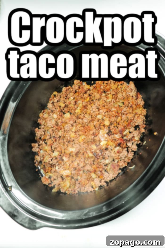 Effortless Slow Cooker Taco Meat 7 Close-up of savory crock pot ground beef, seasoned and ready for serving.