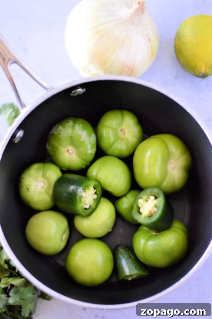 Unlocking the Flavor of Tomatillos 3 A vibrant display of fresh tomatillos and fiery jalapeños, ready to be transformed into a zesty homemade salsa or other Mexican-inspired recipes.