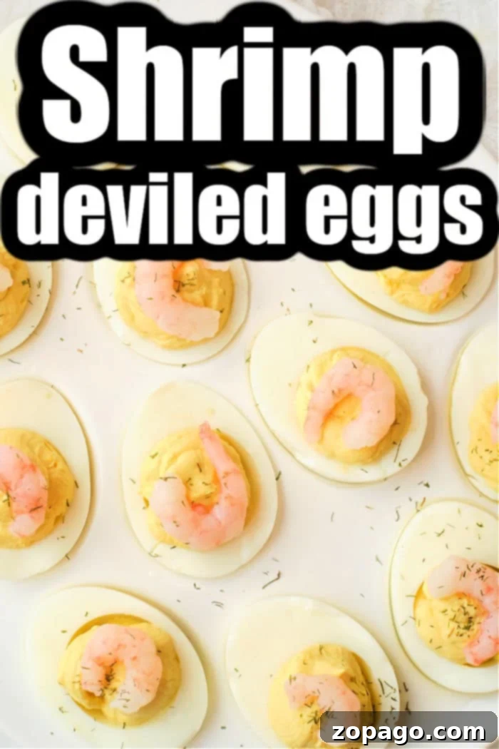 Gourmet Shrimp Deviled Bites 6 Exquisite shrimp deviled eggs, artfully arranged and garnished, showcasing a gourmet appetizer with fresh herbs.