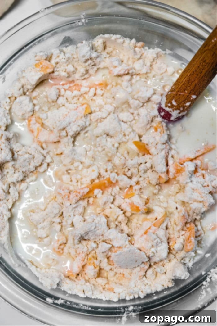 Fluffy Bisquick Biscuits Every Time 4 Freshly baked homemade Cheddar Bay Biscuits, golden brown and perfectly risen, showcasing the flaky texture achieved with cold butter.