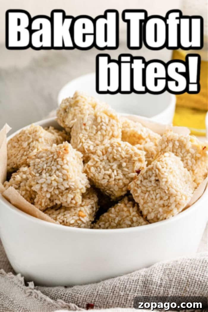 Crispy Tofu Bites 8 A bowl of sesame-coated tofu nuggets exudes a crispy allure, adorned with bold text: Baked Tofu Bites!