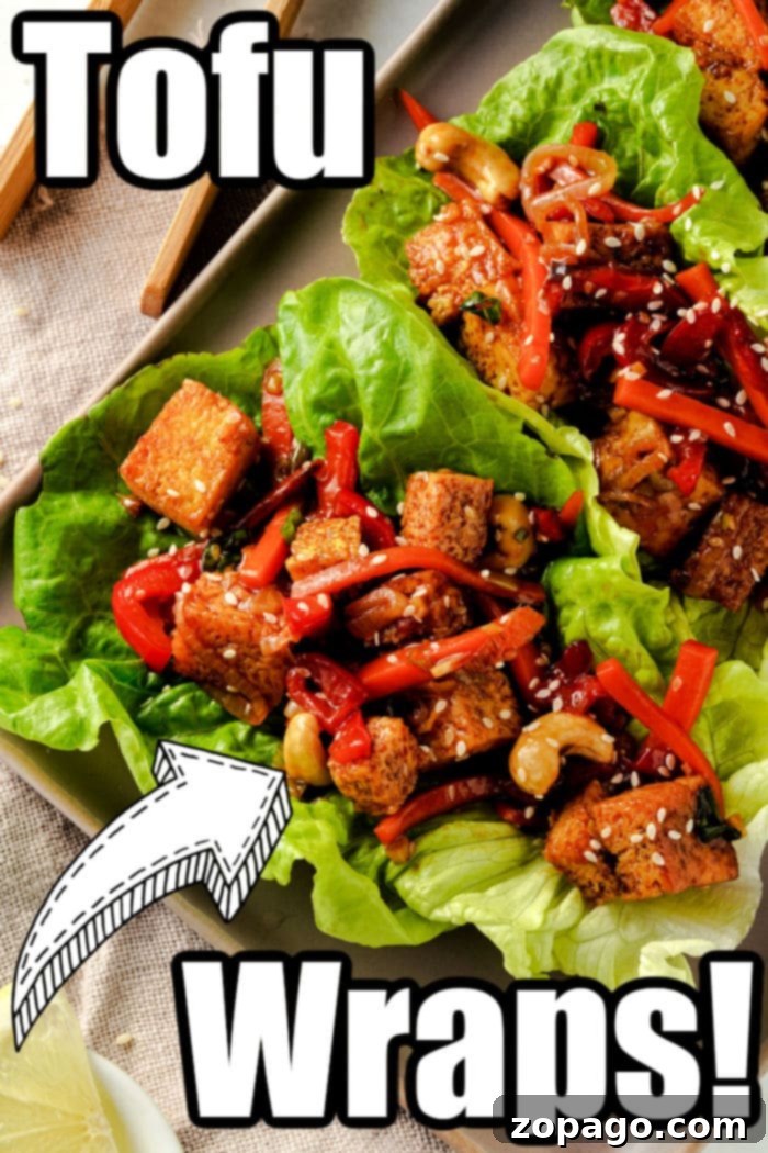 Umami Teriyaki Tofu Lettuce Wraps 6 Tofu Lettuce Wraps - A close-up of a perfectly assembled teriyaki tofu lettuce wrap, ready to eat.