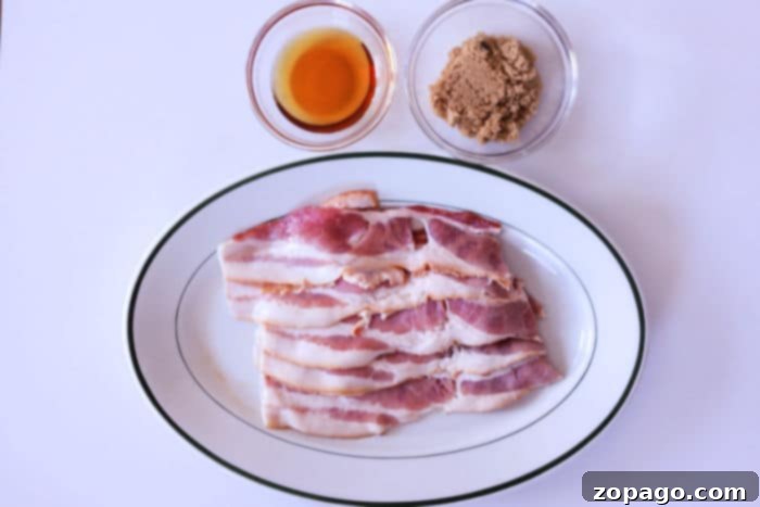 Air Fryer Bacon Candy 3 Raw bacon strips, coated with a sweet glaze of maple syrup and brown sugar, ready for the air fryer.