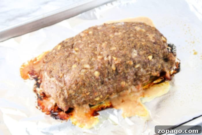 Lipton Onion Soup Meatloaf 5 A golden-brown baked old-fashioned meatloaf, ready for slicing.