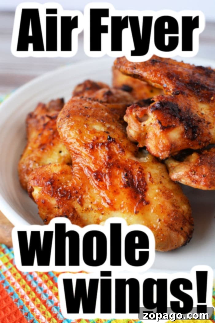 Crispy Air Fryer Whole Chicken Wings 8 A vibrant and appetizing display of crispy whole chicken wings, garnished and ready to be served.