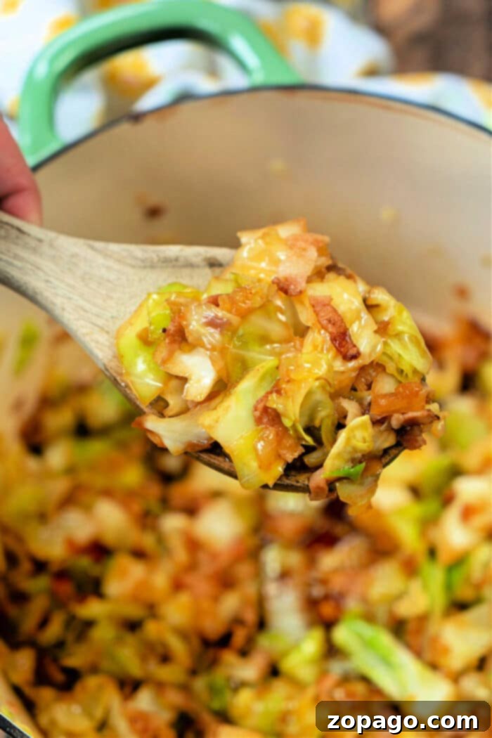 Golden Southern Skillet Cabbage 2 Southern Fried Cabbage, a hearty and flavorful dish cooked in a Dutch Oven.