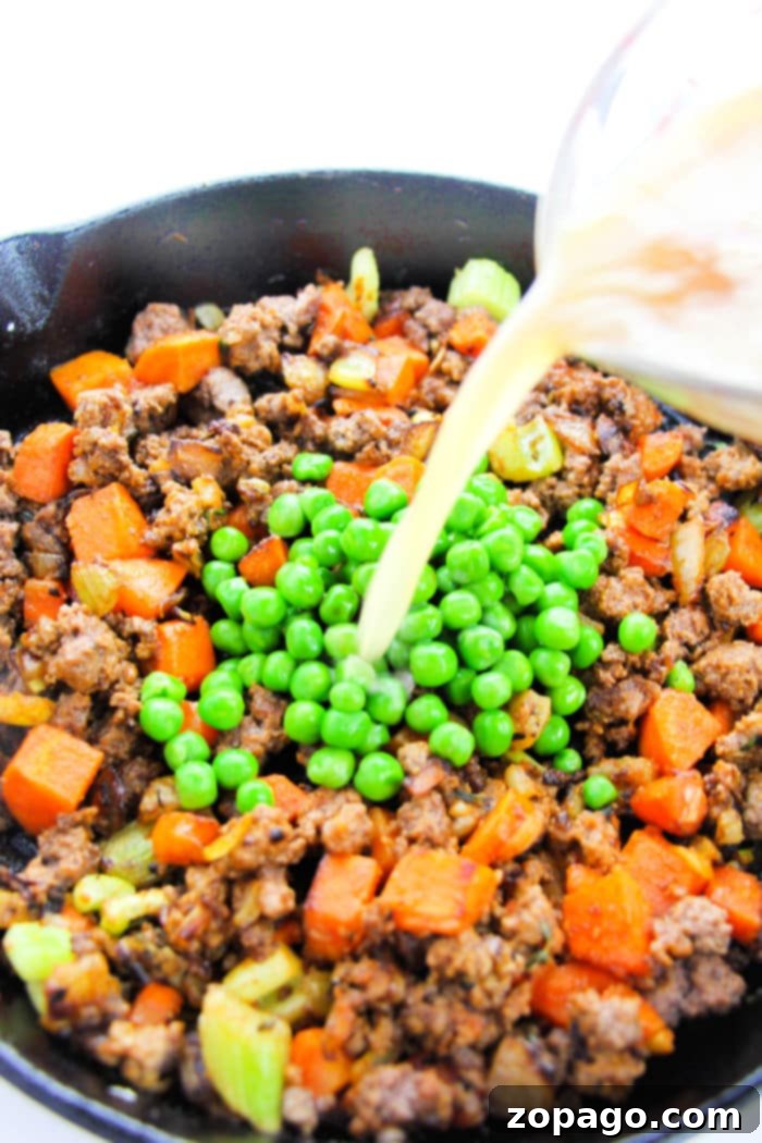 Easy Shepherd's Pie with Instant Mash 4 Close-up of Shepherd's Pie with instant potatoes, featuring a golden, slightly browned potato topping.
