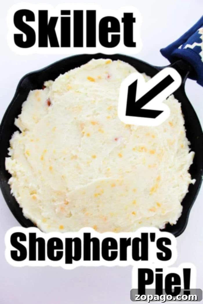 Easy Shepherd's Pie with Instant Mash 5 Shepherd's Pie served in a cast iron skillet, with a perfectly browned potato crust.