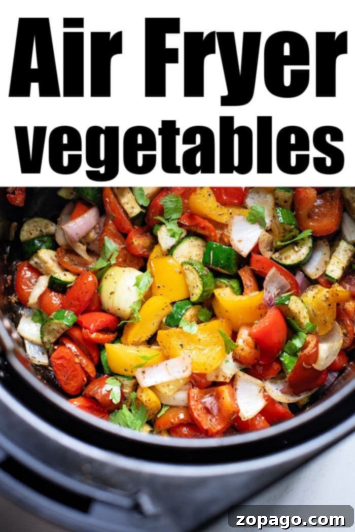 Crispy Mediterranean Air Fryer Vegetables 5 Close-up of air fryer roasted Mediterranean vegetables, showing their perfectly charred edges and vibrant colors.