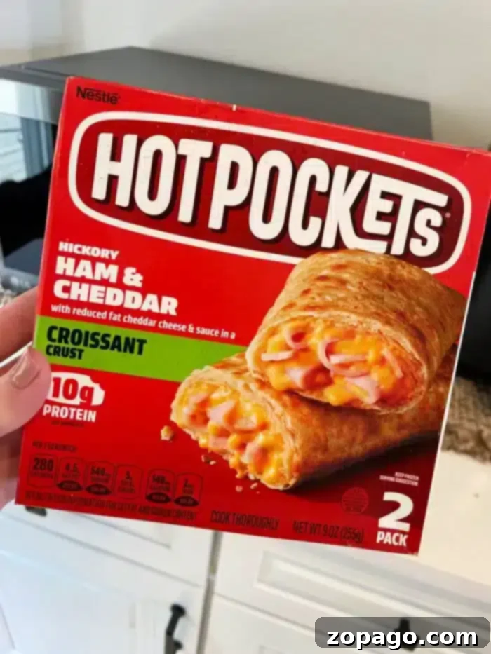 No More Cold Spots Hot Pocket Cook Time Secrets 3 A person holding a box of Nestlé Hot Pockets wonders,