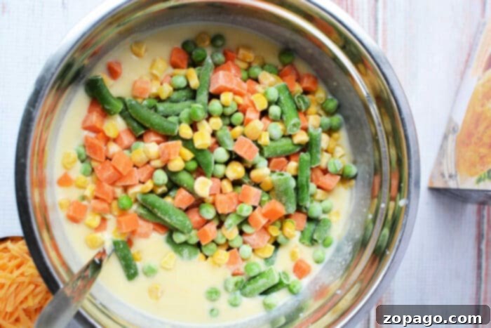 Chicken Pot Pie Topped with Cheddar Bay Biscuits 4 Creamy Chicken Pot Pie Filling with Frozen Vegetables