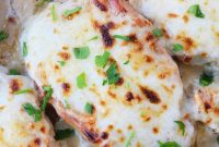 Juicy Oven-Baked Pork Chops with Garlic Roasted Potatoes